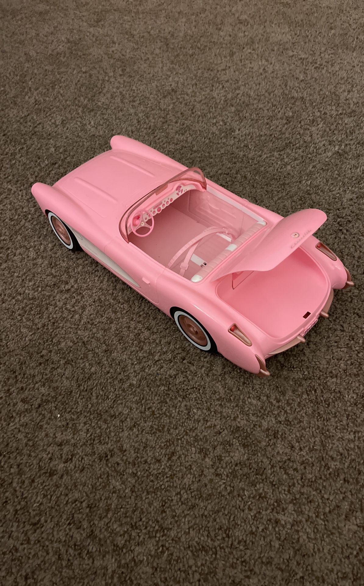 The Hot Wheels RC Barbie The Movie Barbie Corvette is a remote-control 1956 Corvette Stingray that is based on the one in Barbie The Movie. It can hol