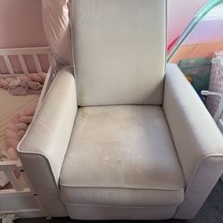 Nursing chair with recliner and rotator