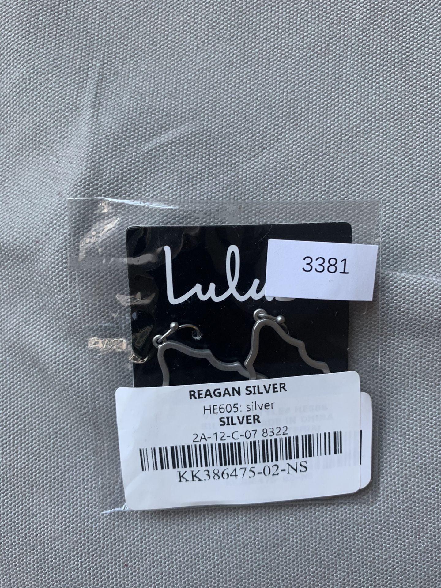 Lulu’s silver earrings