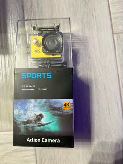 New action camera with 4K Ultra HD video resolution and 12MP photo capability. This yellow and black camera is waterproof up to 30 meters and has a 17