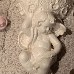 Decorative Cherub Angel wall sconce like brand new , about 26 in tall
