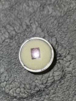 Loose Faceted 3.3 carat Amethyst Gemstone in Display Case