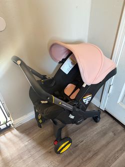 Doona + stroller car seat pink with base