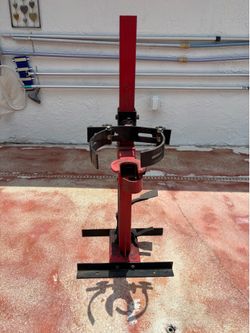 Hydraulic spring compressor