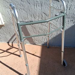 Medical Deluxe Two Button Folding Walker with 5" Wheels 5 Inch Wheels.