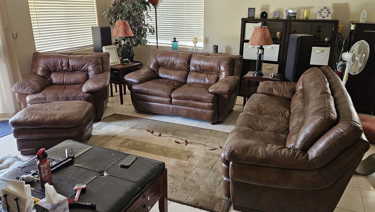 FREE Leather Couch, Loveseat, Chair with Ottoman $3,400 + Rug