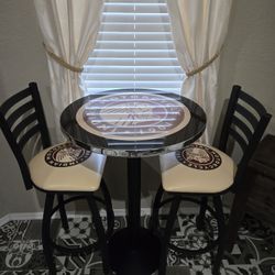 Like New Indian Motorcycle Logo Pub Bar Table with Round Stand and 2 30" Swivel Counter Stools. Never been used. Was just sitting as decoration in man