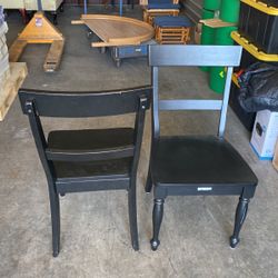 Two Black Wood Finished Chairs 