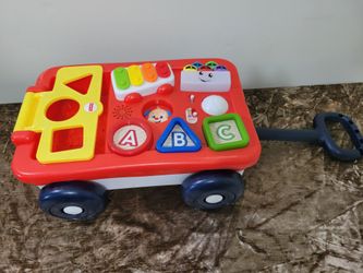​Fisher-Price Laugh & Learn Pull & Play Learning Wagon Musical Toddler Toy