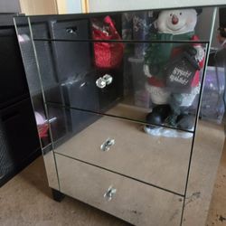 Beautiful mirror nightstand, brand new with a small corner dent