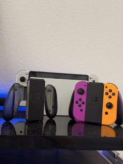 Nintendo Switch OLED White + HORI Mario Kart Wheel Stand & Pedals + Extra Joy-Cons + Games