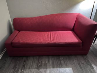 Red loveseat size sofa bed / great condition but HEAVY