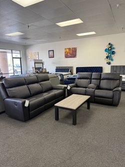 Dark Gray Leather Reclining Sofa and Loveseat Set