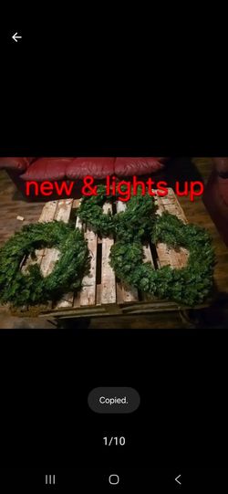 Lots of holiday wreaths and extras