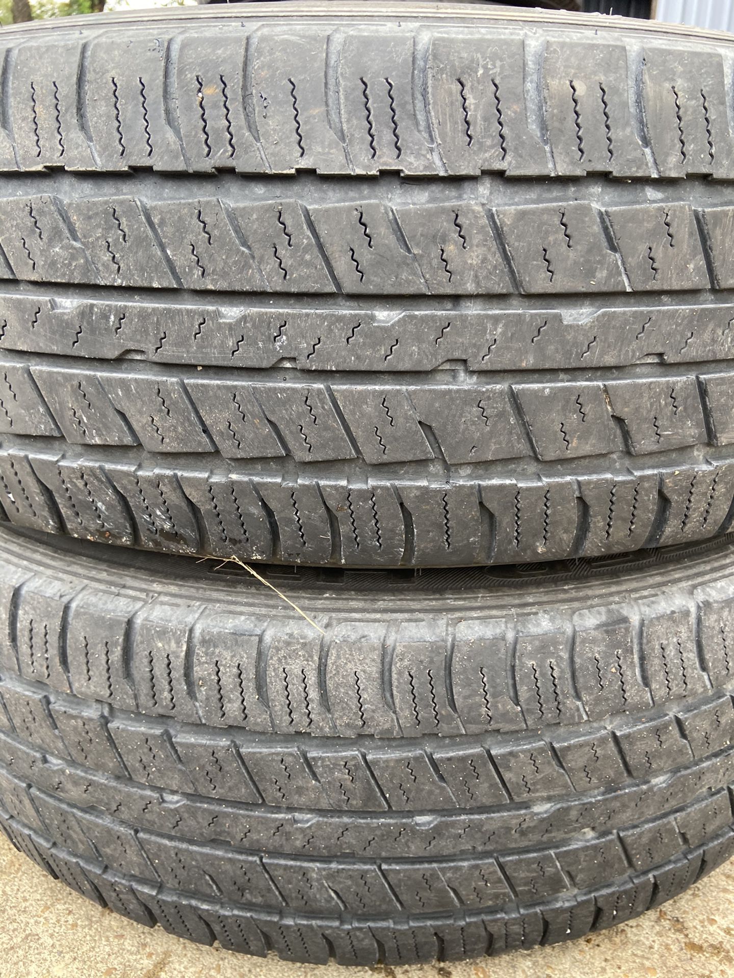 Two 235-60-R18 tires