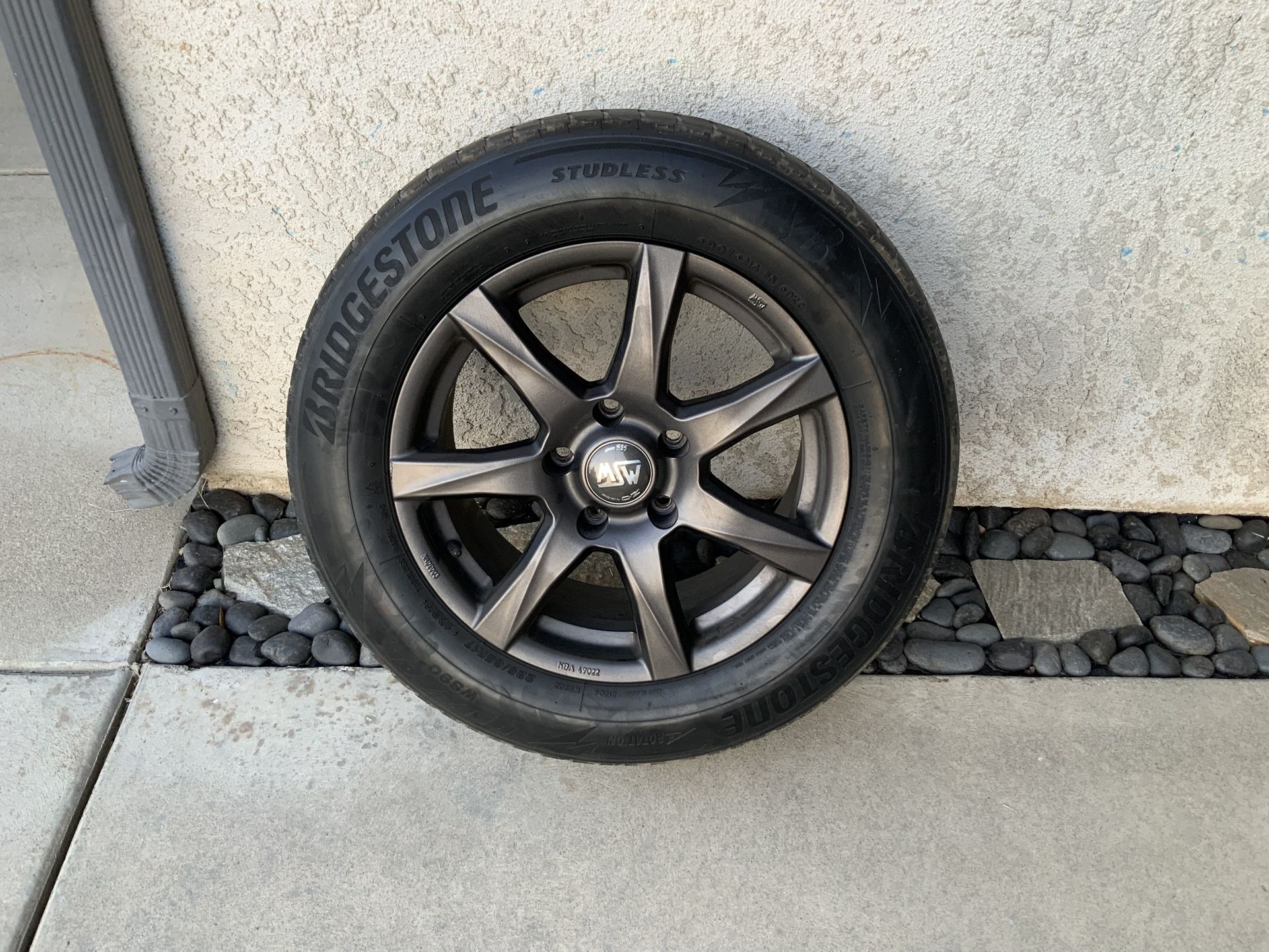Bridgestone Blizzak Premium All-Weather Tires with rims