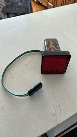 Hitch cover with brake light