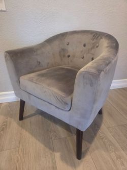 Grey velvet barrel chair