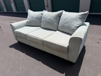 Light Green Fabric Loveseat with Throw Pillows