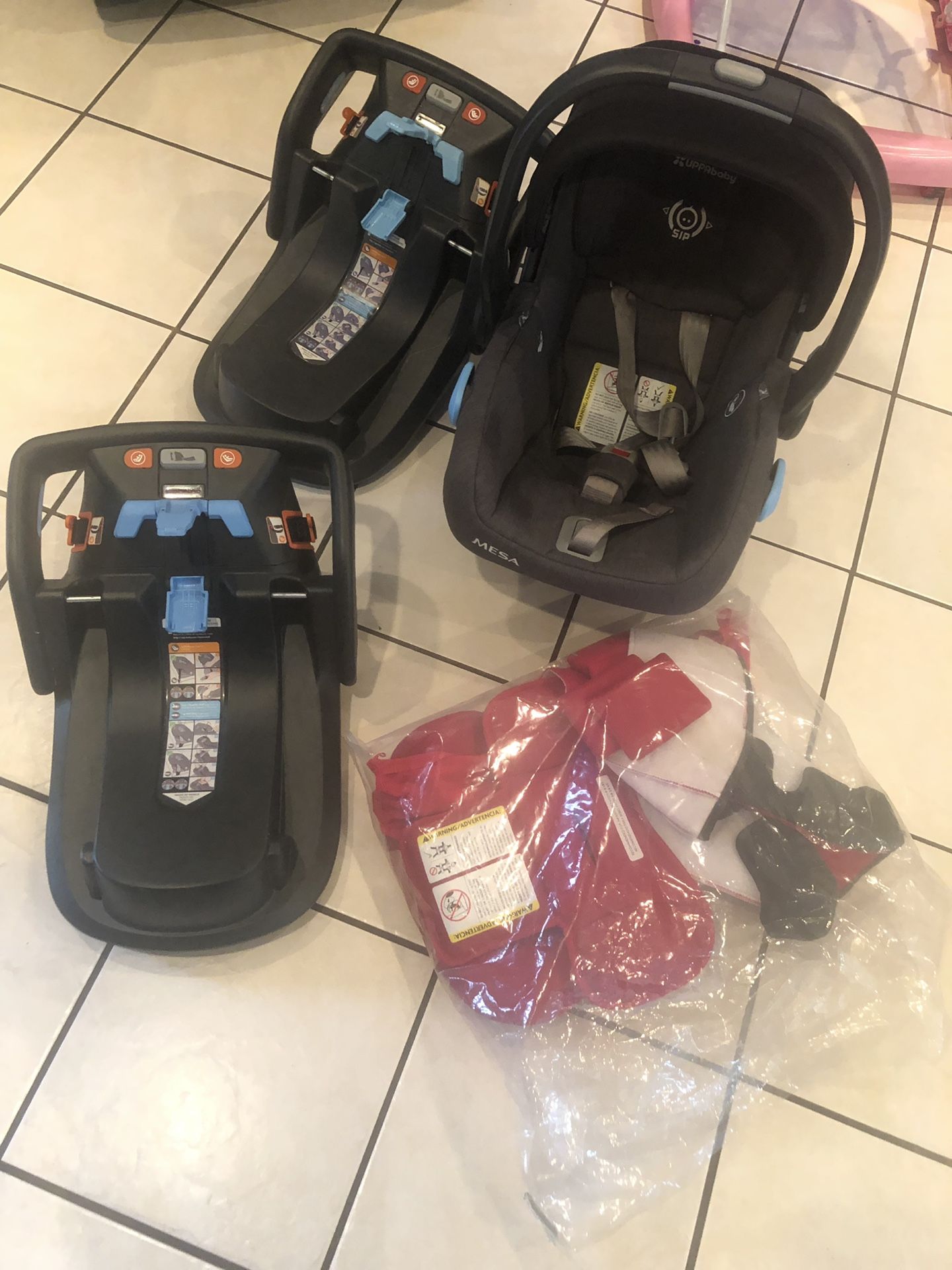 Uppababy Car seat, two bases and a red Deny fabric replacement