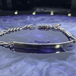 $100 Silver Figaro ID Link Bracelet
