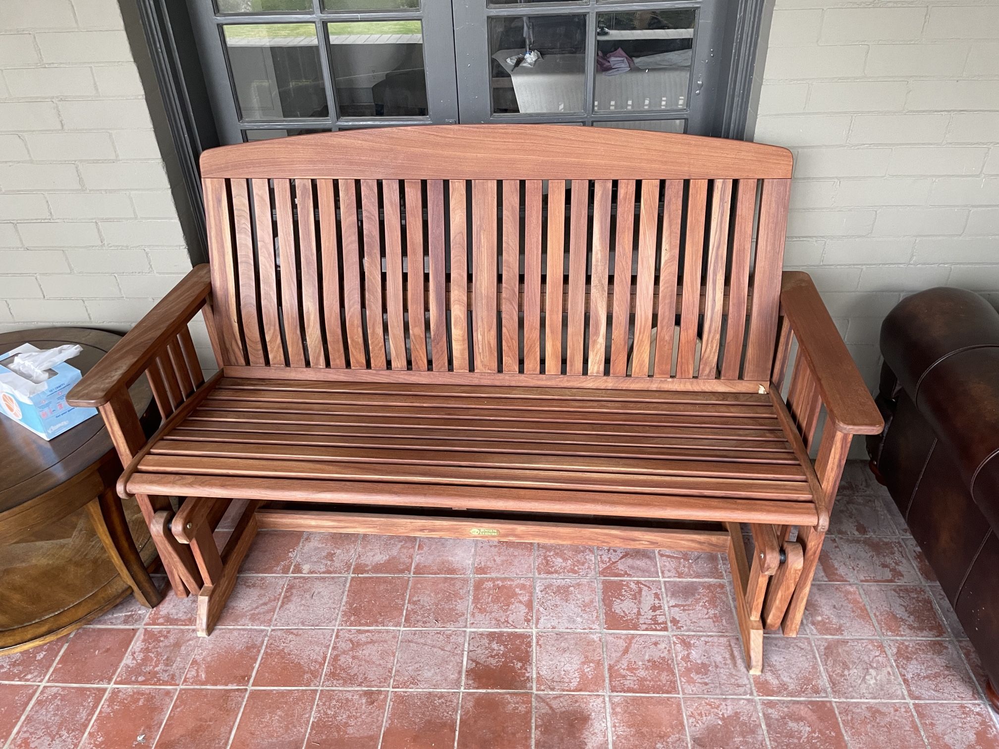 Brown rocking bench