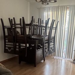 Table With Wine Each And Cabinet 6 Chairs 