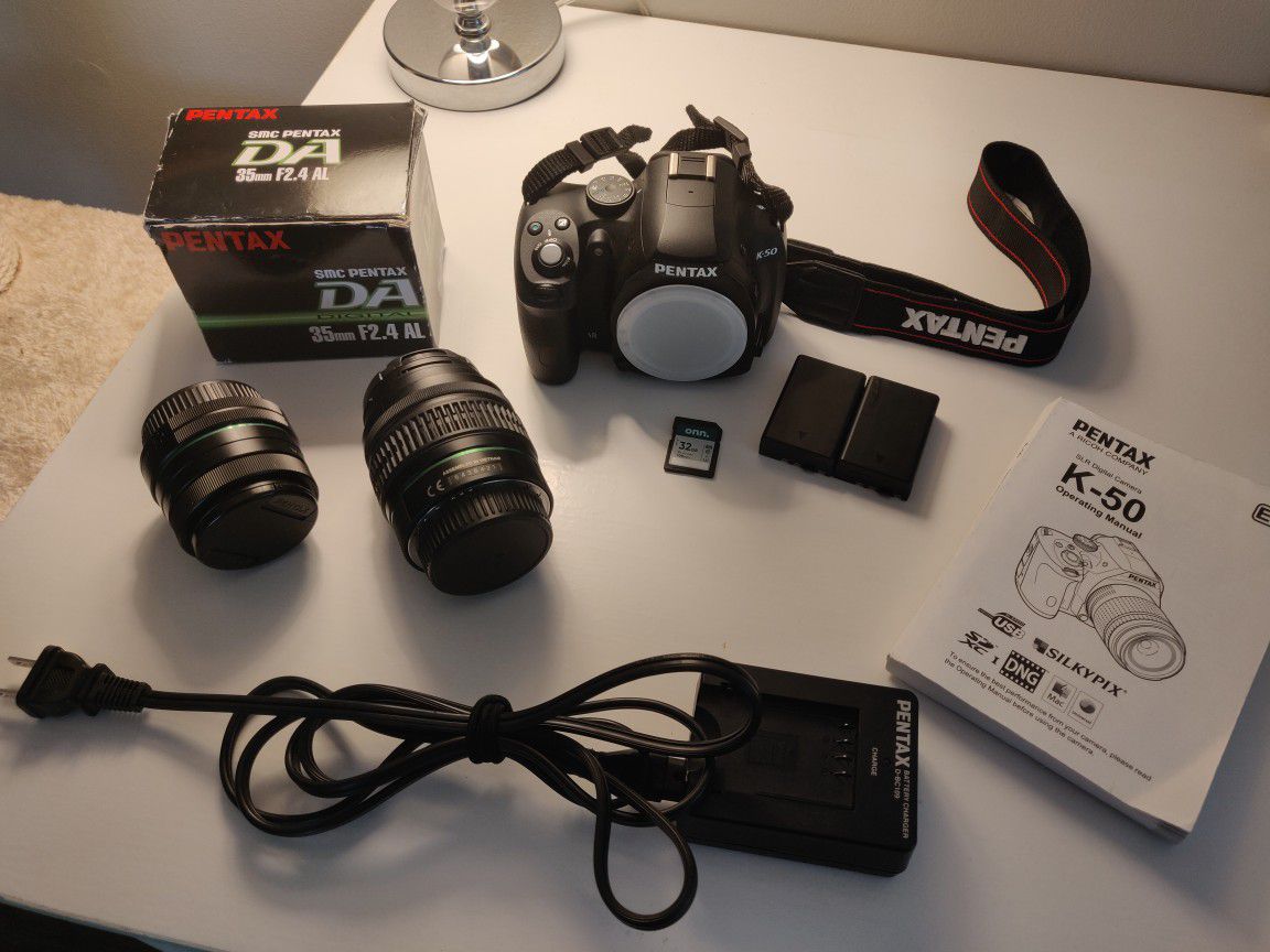 PENTAX K-50 DSLR with 18-55mm and 35mm lenses