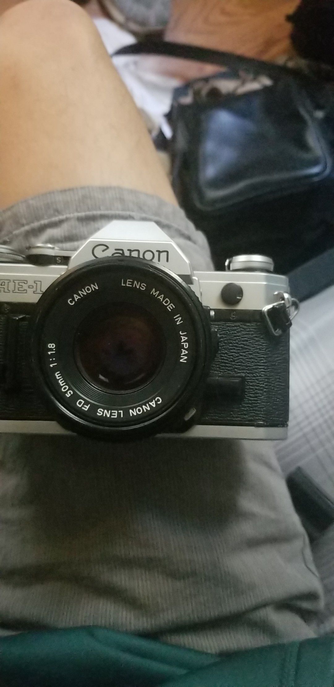 Canon AE-1 with lenses.