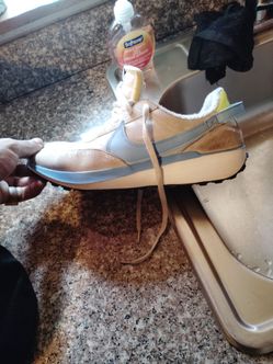Nike runners light blue and a lil gray