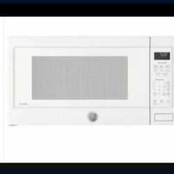2.0 cu. ft. Countertop Microwave in White.horno microondas suct dimensions: hx24-1/8"w x 19-3/8"d oduct weight: 0.1 lbs