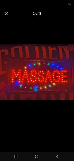 Massage sign. Lights up