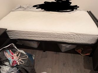 Twin mattress with steel bed frame - great condition!
