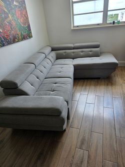 El Dorado Gray Fabric Sectional Sleeper Sofa with Right Chaise $750