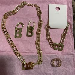 beautiful stainless steel set.  chain, ring, earrings and bracelet