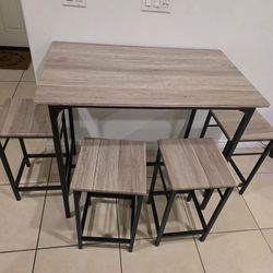 Table And 4 Chairs