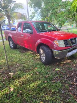 Nissan Frontier Extended Cab Pickup Truck Red