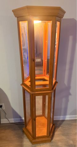 NEED GONE DELIVERY AVAILABLE  Corner curio cabinet
