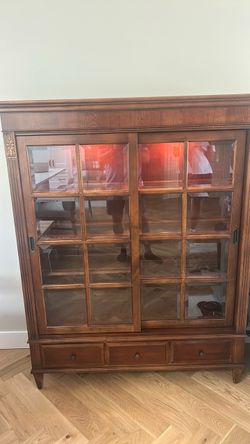 Ethan Allen sliding gloss door  bookcase.