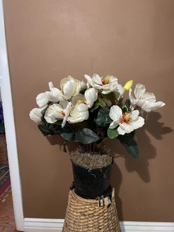 faux floral arrangement featuring white magnolia flowers