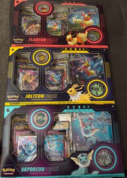 Pokémon TCG: Eeveelution VMAX Premium Collection Set (Flareon, Jolteon, Vaporeon).