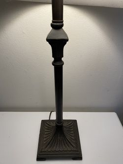 Antique cast iron lamp