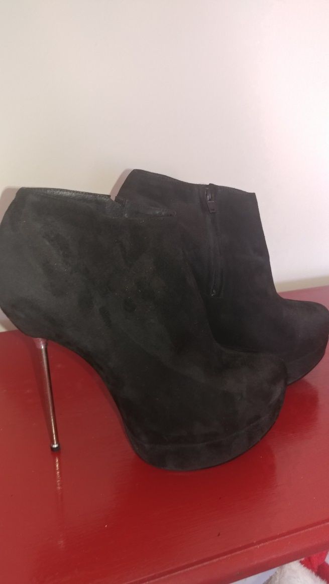 Steel heel ankle booties