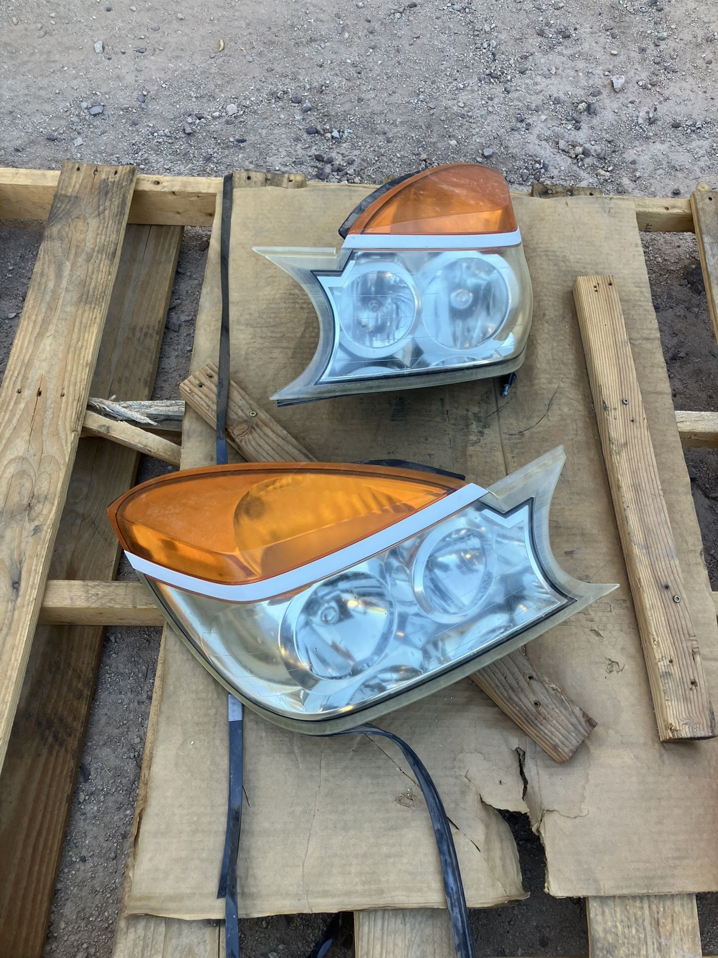 Rendezvous Headlights Pair
