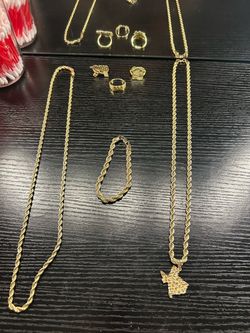 Gold chains and bracelet and rings