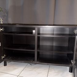 Old TV Stand With Shelves And Glass Windows.