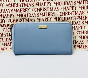 Kate Spade Laurel Way Neda zip-around continental wallet in a "Cloudcover Blue"
