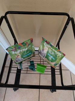 Bird cage stand plus two bags of food and feeders