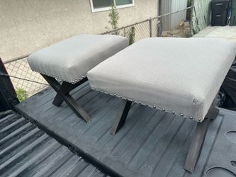Grey upholstered wood ottoman