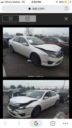 20*10. Ford Fusion - 4 Cyl- leather interior- hit light in the front - 103,000 miles- clean title